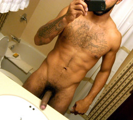 Naked black men photographing himself..
